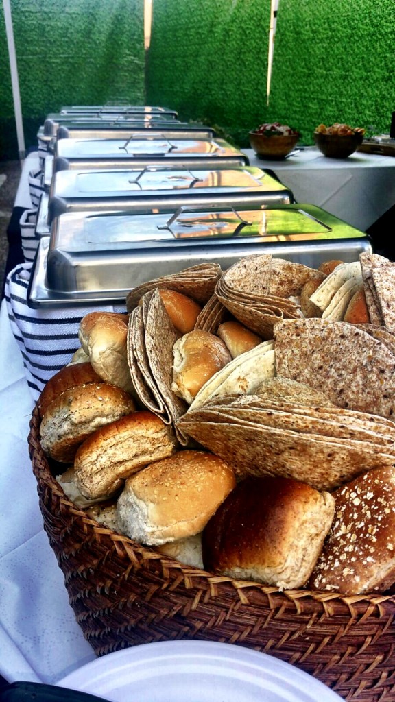Fresh Bread Rolls And Serving Dishes